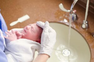 bathing newborn